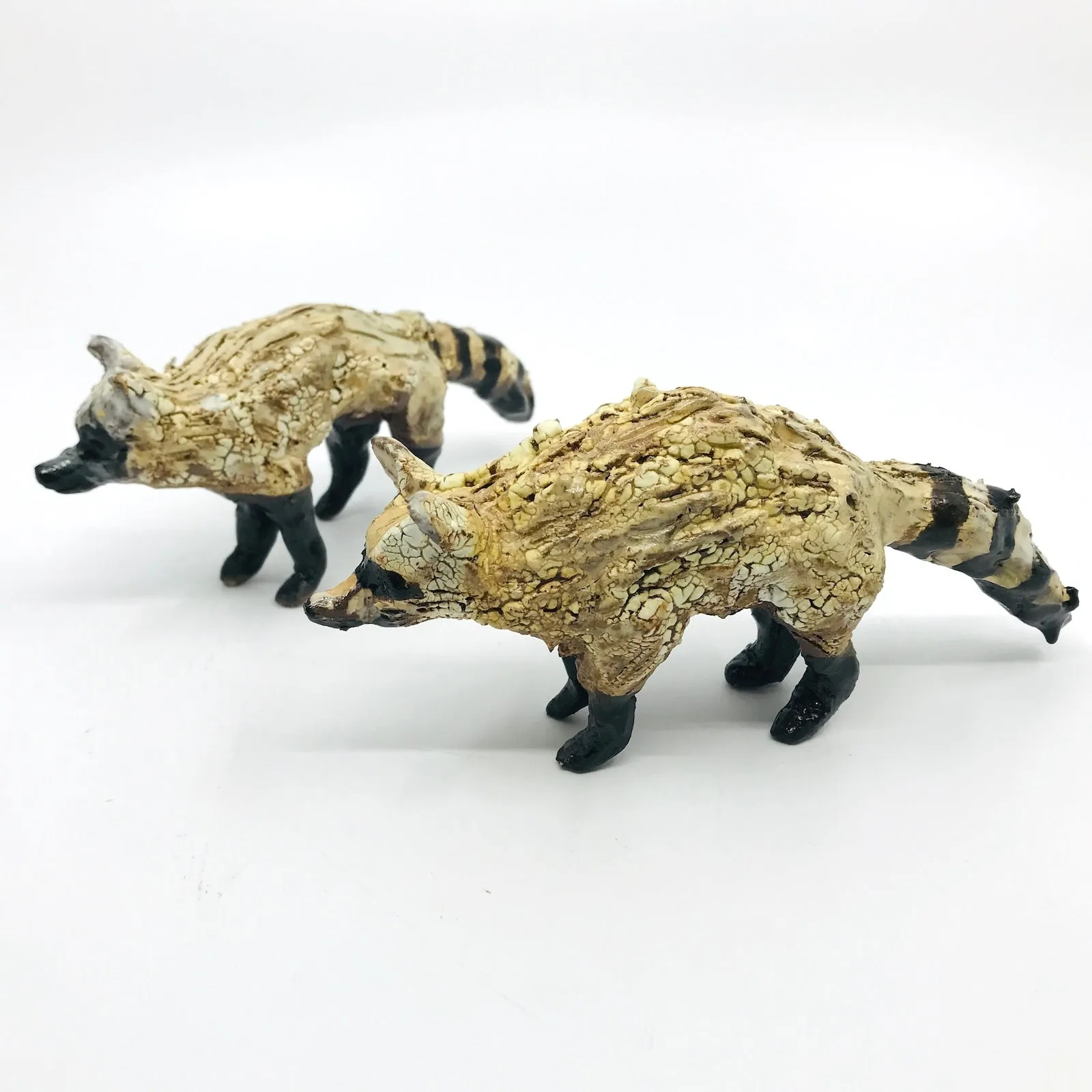 Raccoon Ceramic Sculptures by Erin Robertson