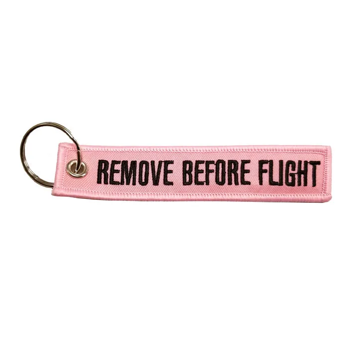 Remove Before Flight Pink Keychain